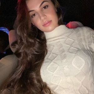 White knitted dress with open back